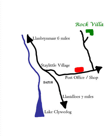 a blue Rock Villa sign).